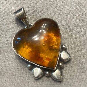 Amber and sterling silver heart pendant